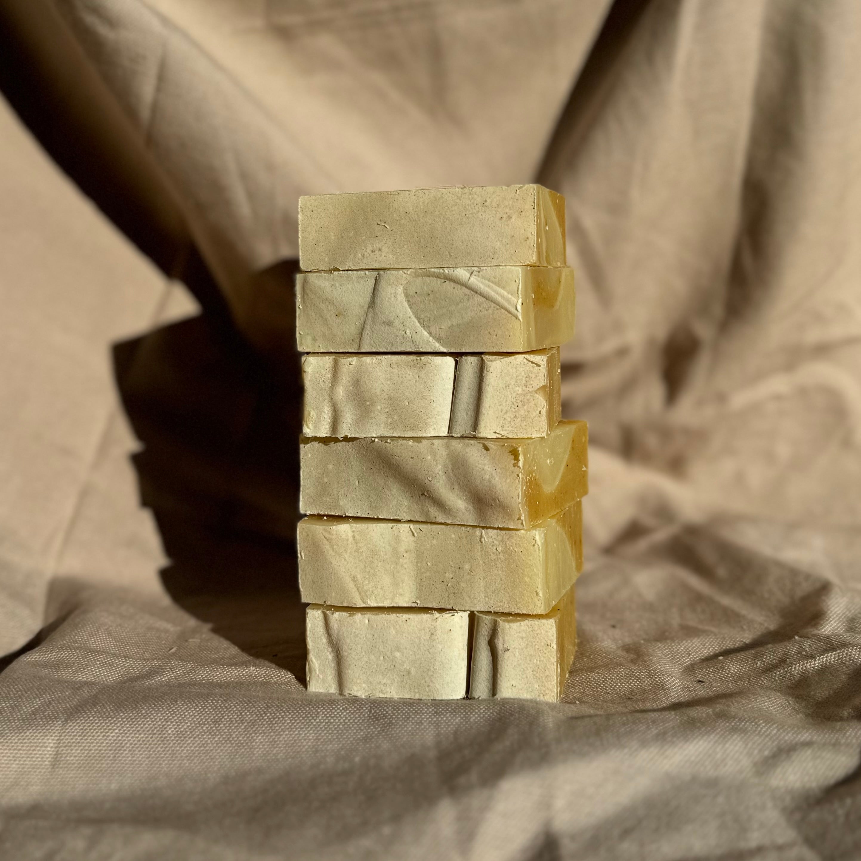 Handmade Soap Club Patchouli & Ylang Ylang body bar soap with a natural, fragrant design and smooth texture visible in the image.