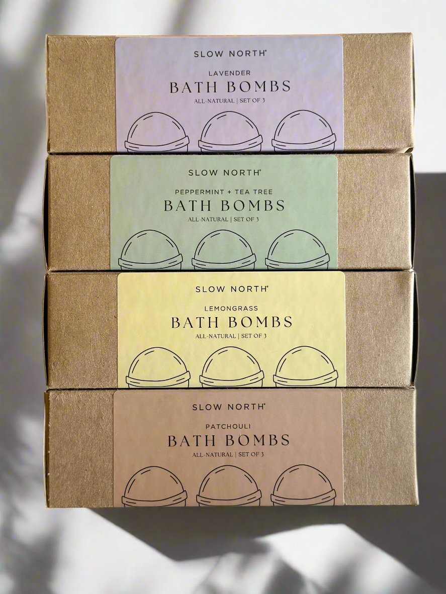 Set of three natural patchouli bath bombs from Slow North, showing colorful round bath accessories for relaxing bath time.