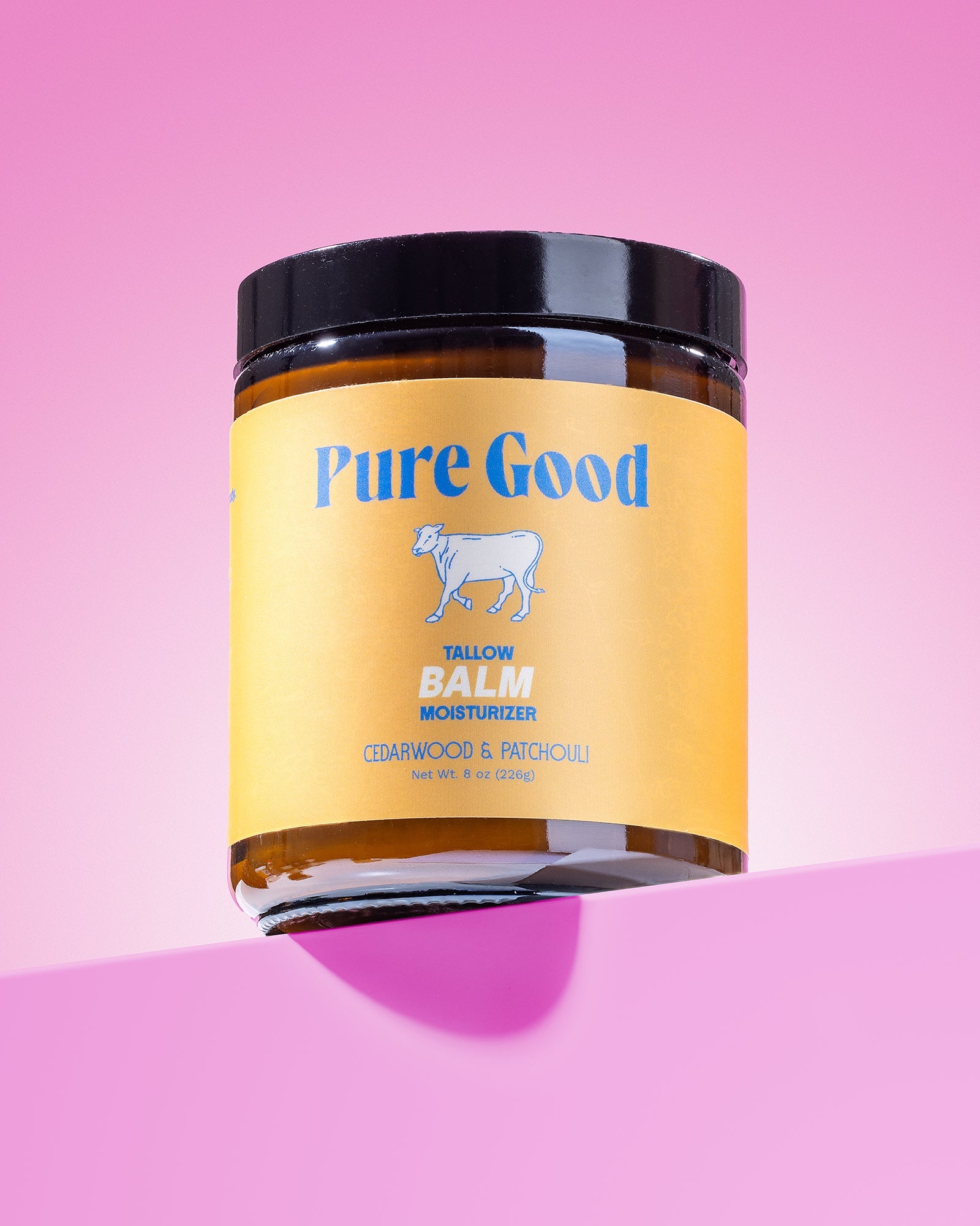 Cedarwood and patchouli tallow balm by Pure Good LLC in an 8oz jar, showcasing a natural, soothing skincare product.