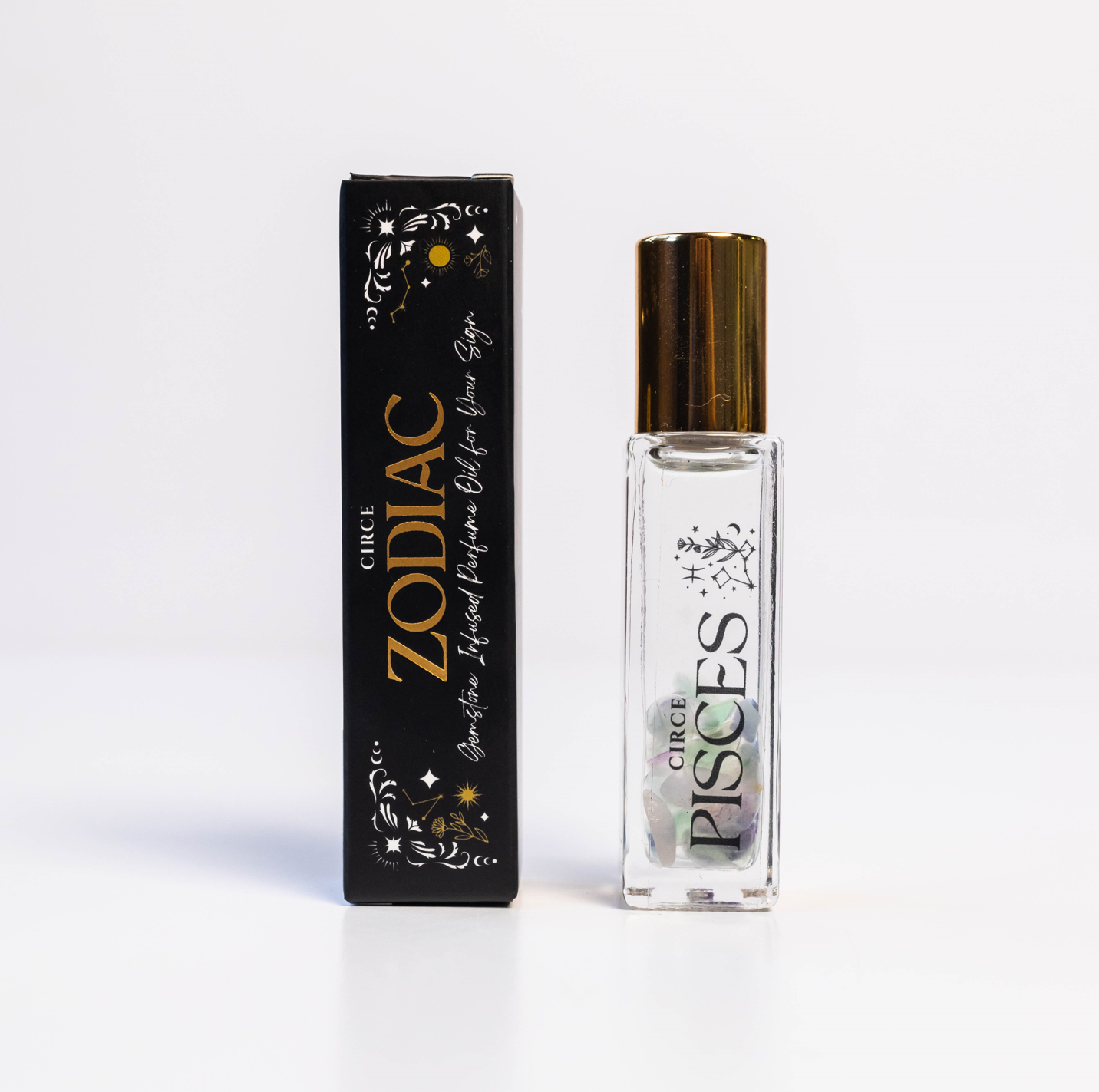 Circe Boutique Zodiac Perfume Oil Set with 12 gemstone-infused zodiac scents in elegant bottles.