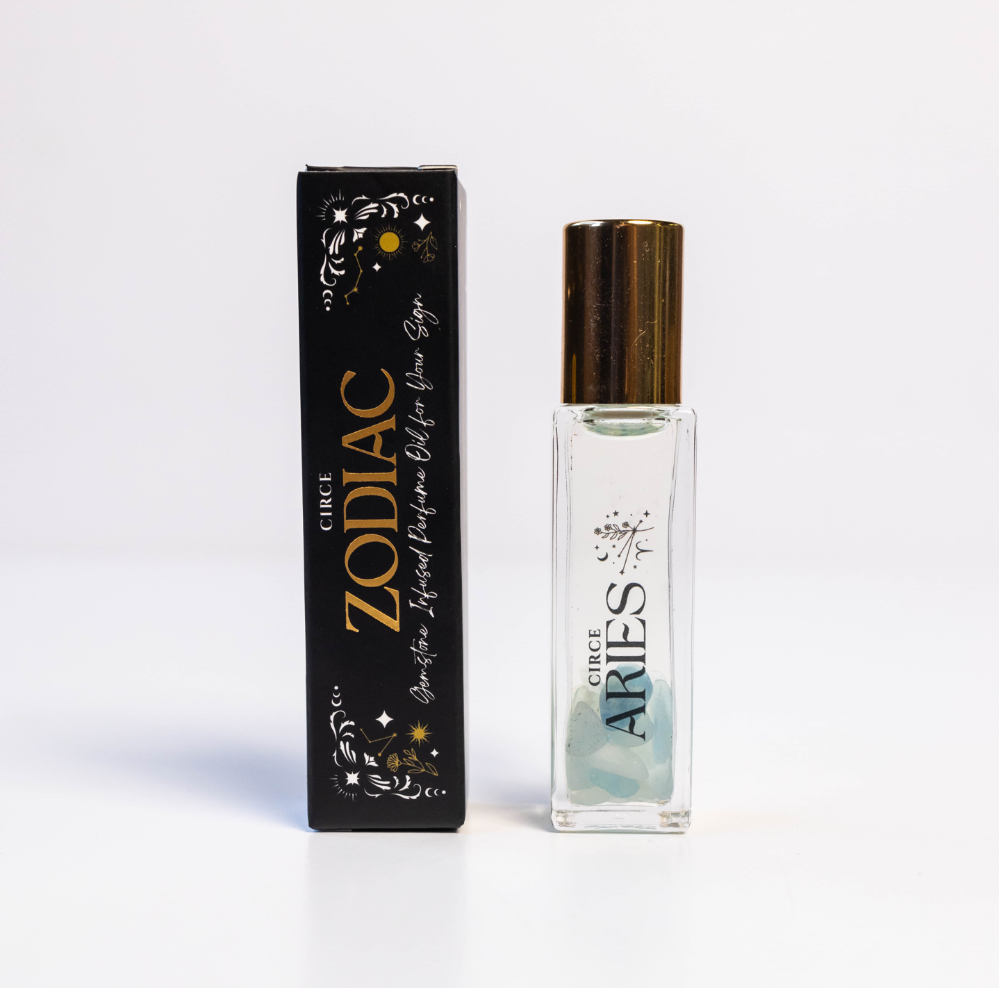 Circe Boutique Zodiac Perfume Oil Set with 12 gemstone-infused zodiac scents in elegant bottles.