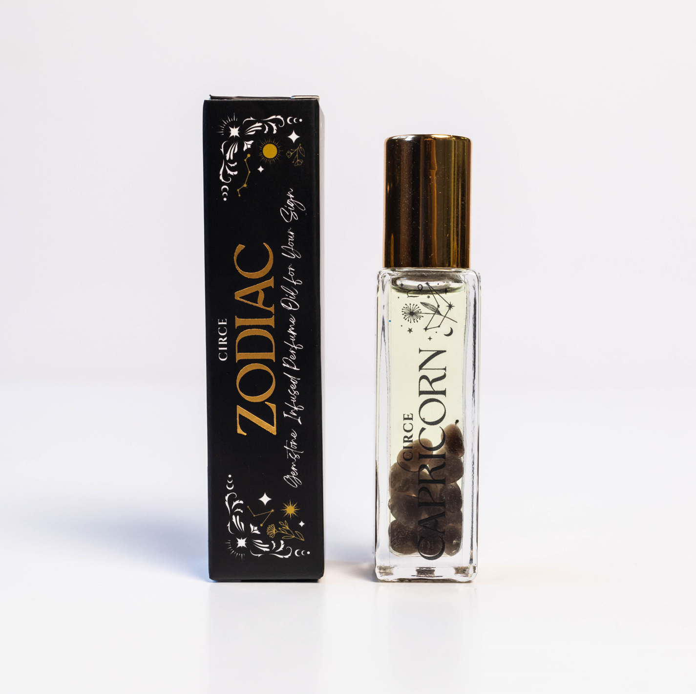 Circe Boutique Zodiac Perfume Oil Set featuring 12 gemstone-infused zodiac scent bottles arranged in a display.