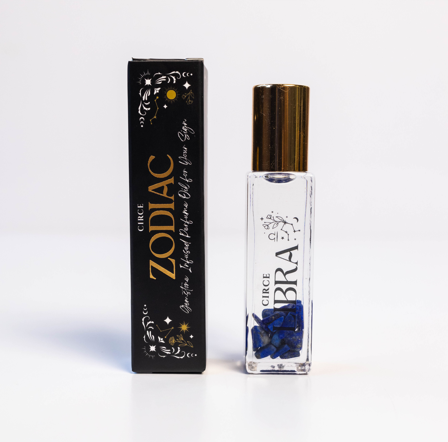 Circe Boutique Zodiac perfume oil set with 12 gemstone-infused scents, featuring individual bottles representing each zodiac sign.